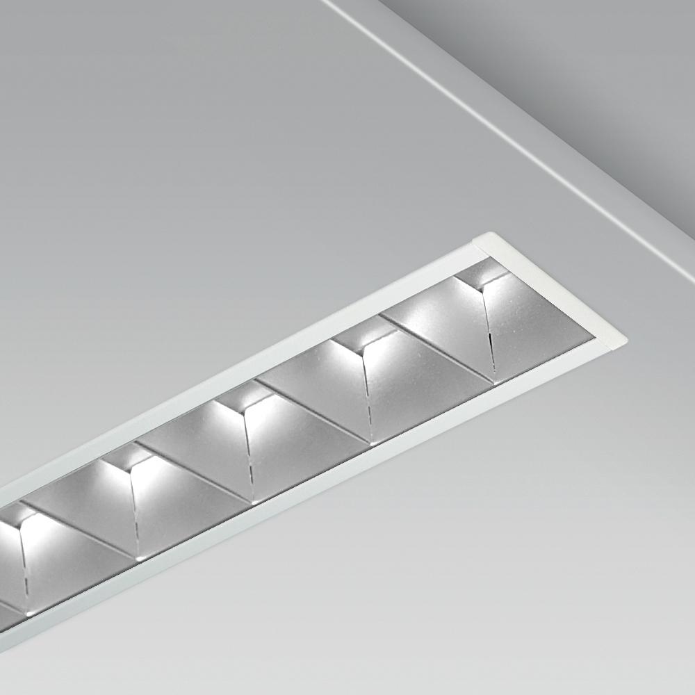 Linear ceiling recessed downlight with a minimalist design for indoor lighting, with lamellar reflector