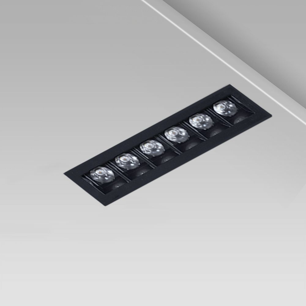 Linear ceiling recessed downlight with a minimalist design for indoor lighting, trimless and with UGR<16 black square optic