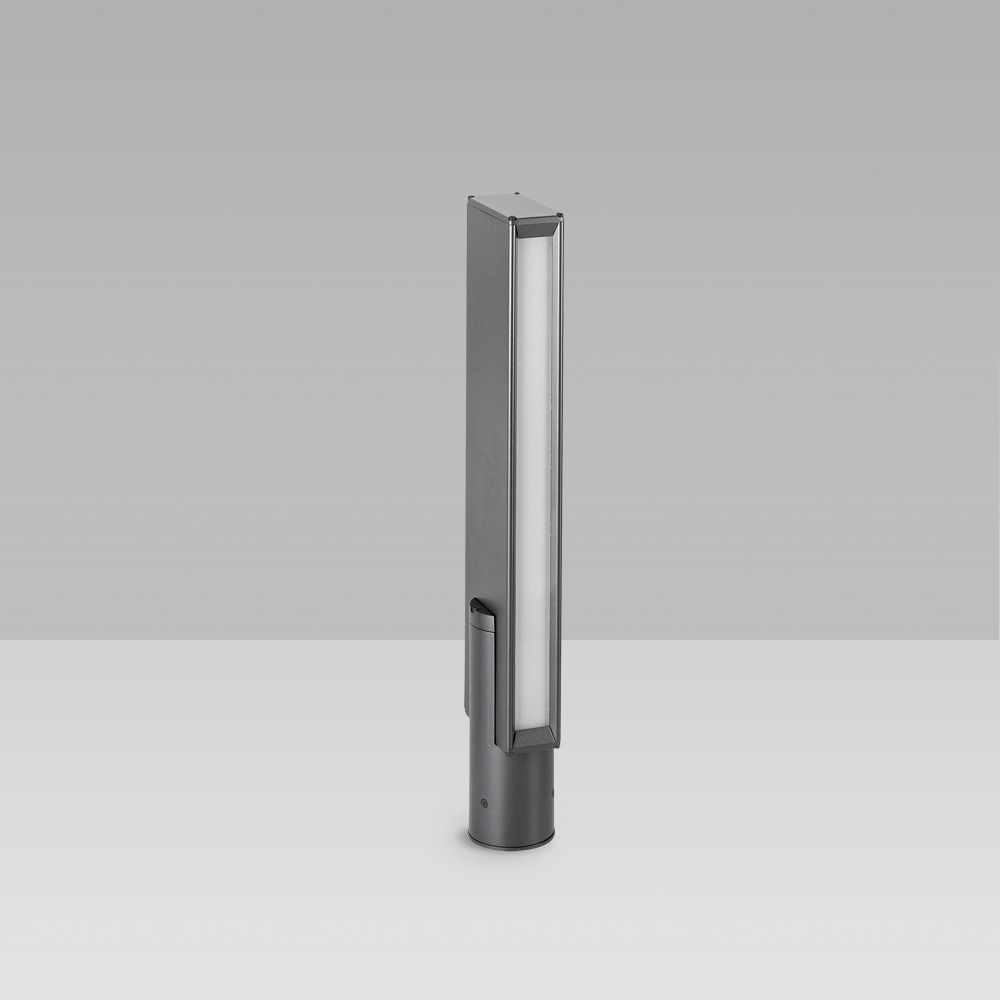 Bollard light for outdoor lighting with a geometric design and monodirctional optic for a precise lighting with high visual comfort